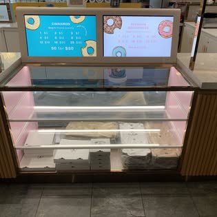 Retail cabinet fitout with lit menu screens wired by Nu Wave Energy